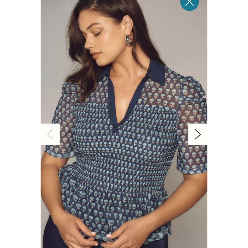 Maeve by anthropologie short sleeve smocked polo top v neckline w/floral pattern